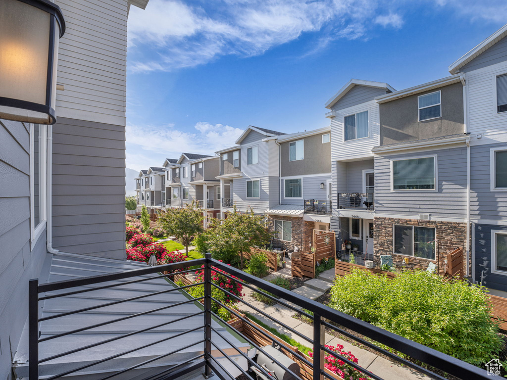 Balcony featuring a residential view