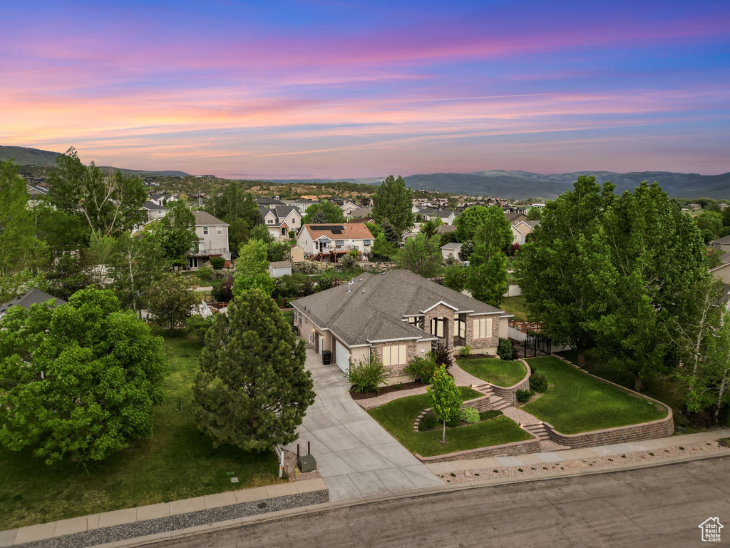 Aerial view of residential area with a mountainous background