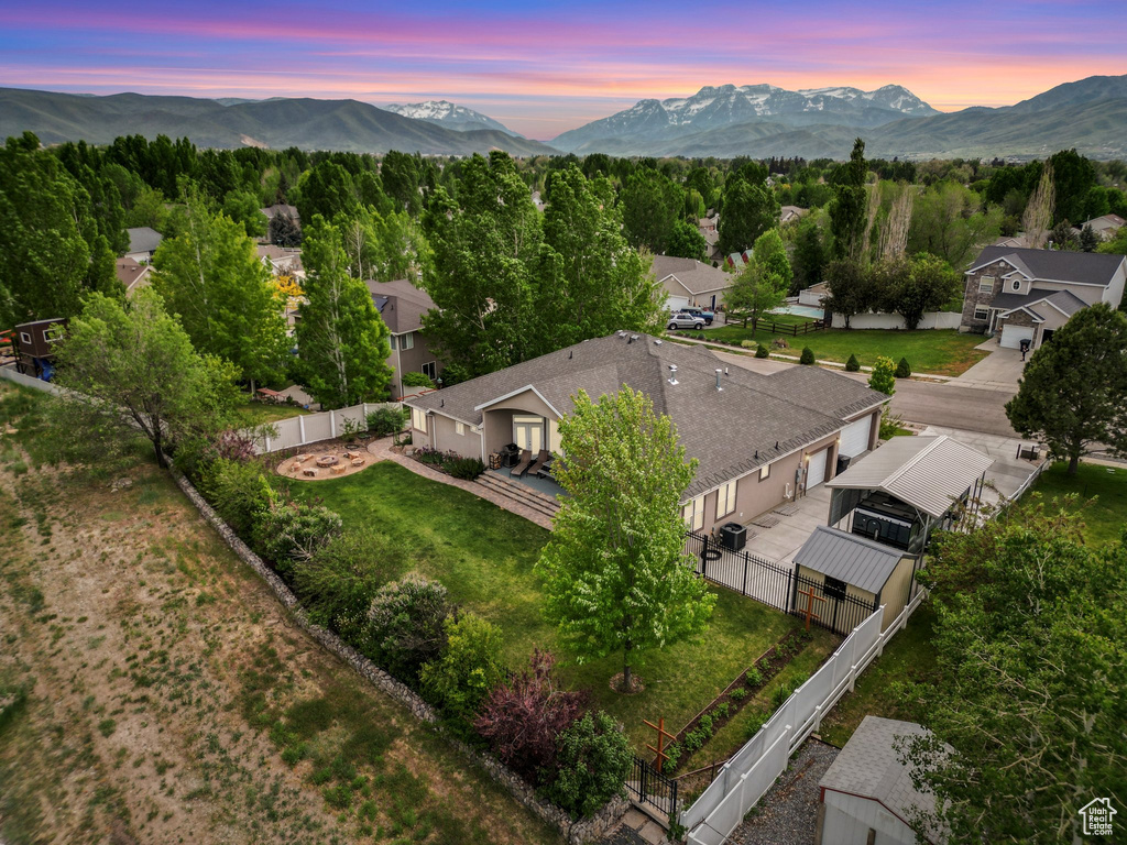 Aerial view of residential area with a mountainous background