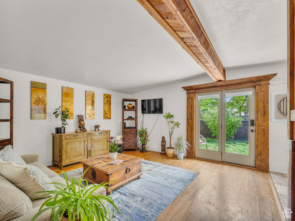 Living area with light wood finished floors