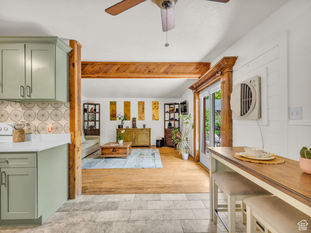 Living room featuring a ceiling fan