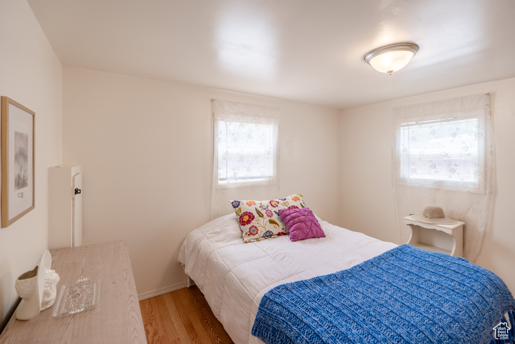 Bedroom featuring wood finished floors