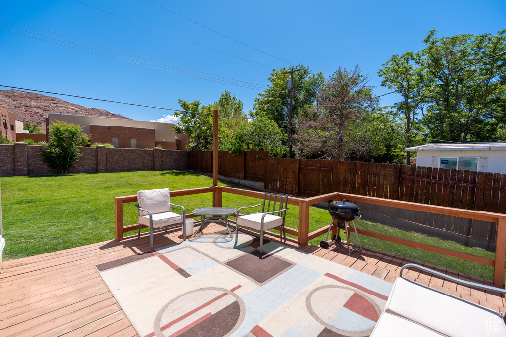 Deck featuring area for grilling