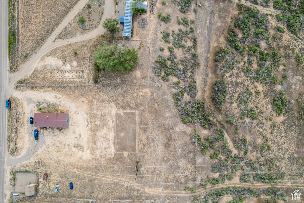 Aerial view of property and surrounding area with a desert landscape and rural landscape