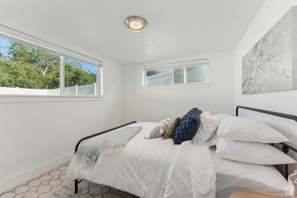 Bedroom featuring baseboards