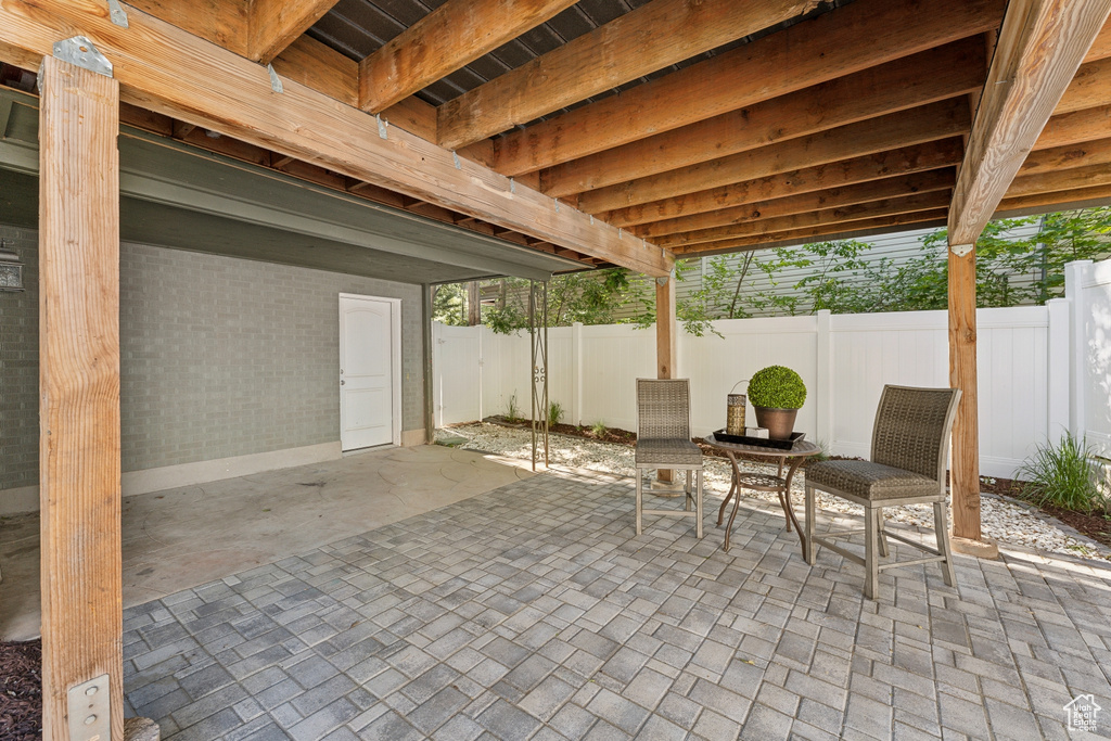 Fenced backyard featuring a patio area