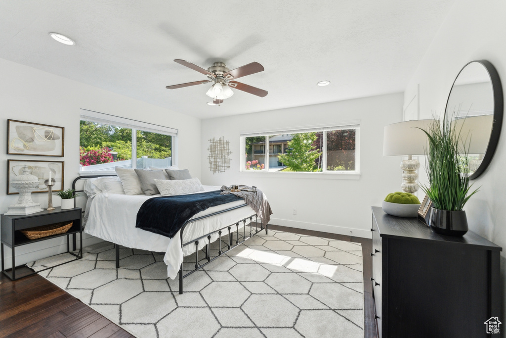Bedroom featuring recessed lighting, light wood-type flooring, a ceiling fan, and baseboards