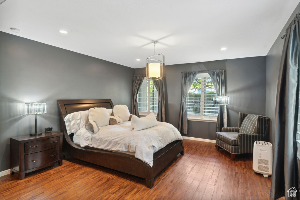 Bedroom with baseboards, hardwood / wood-style floors, and recessed lighting