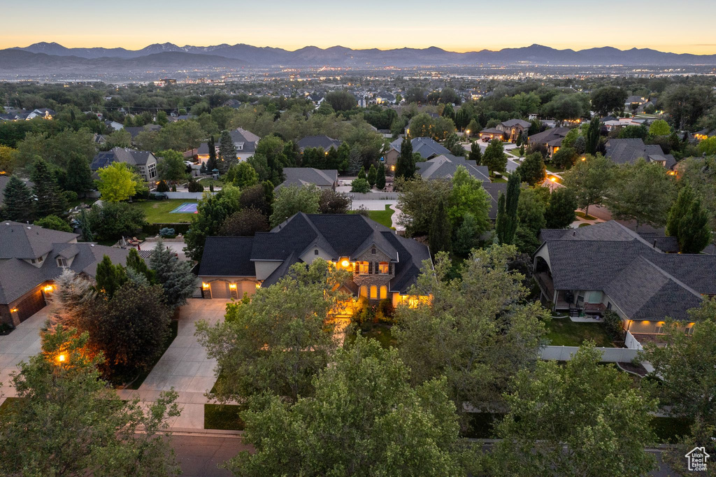 Aerial view at dusk of a mountain view and a residential view