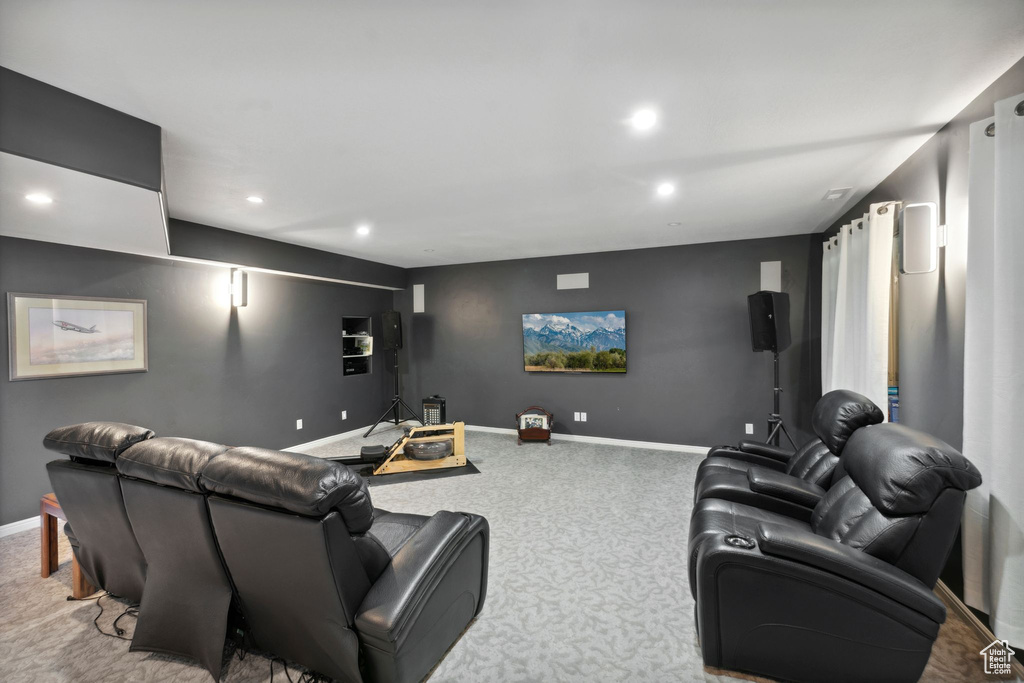 Home theater room with carpet, baseboards, and recessed lighting