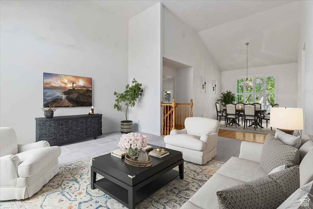 Living area with high vaulted ceiling