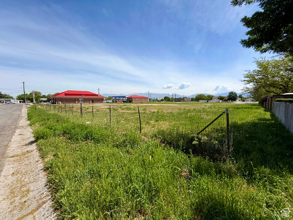View of yard with a view of countryside