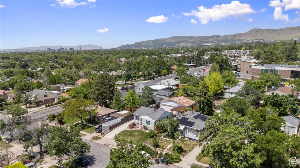 Aerial view of residential area with mountains