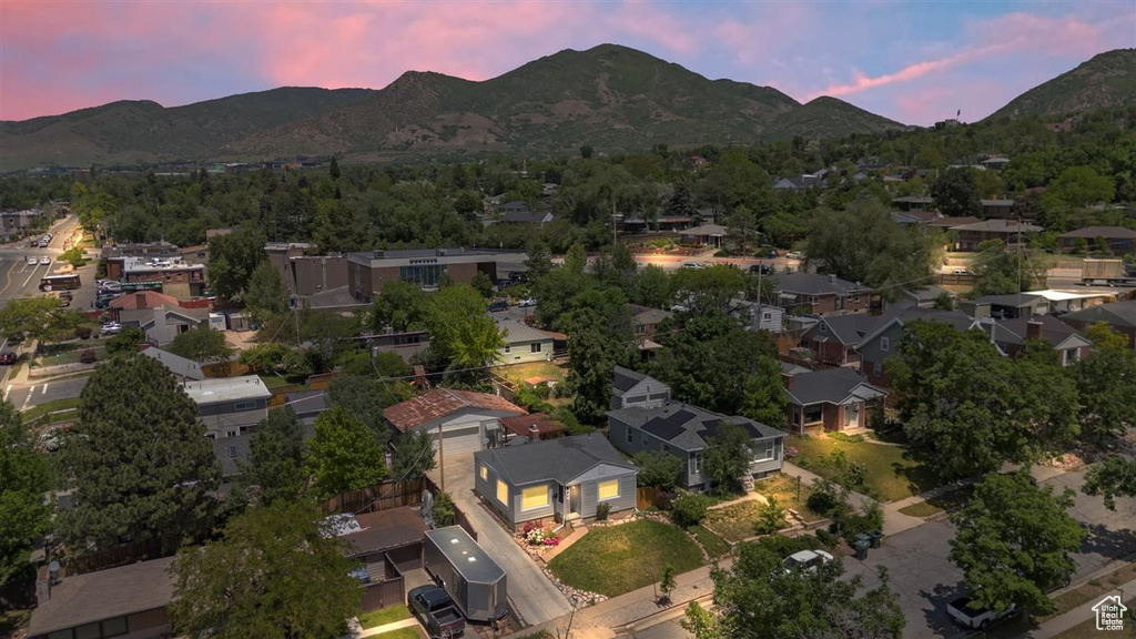 Aerial view at dusk of a mountain view and a residential view