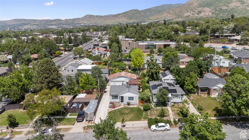 Aerial view of residential area with a mountain backdrop
