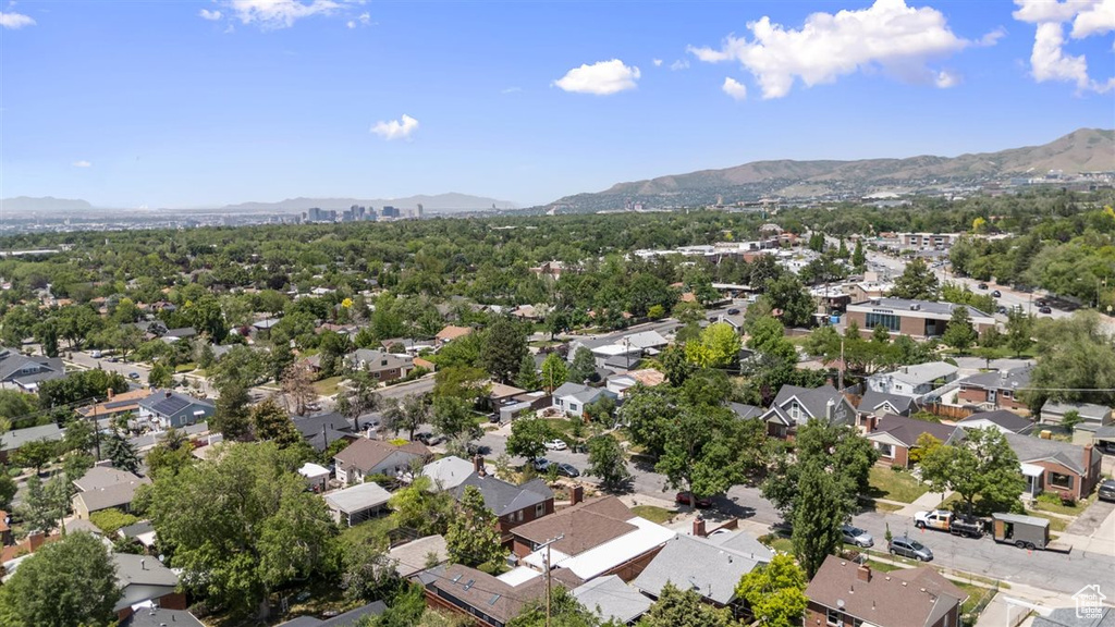Aerial view of residential area with a mountain backdrop