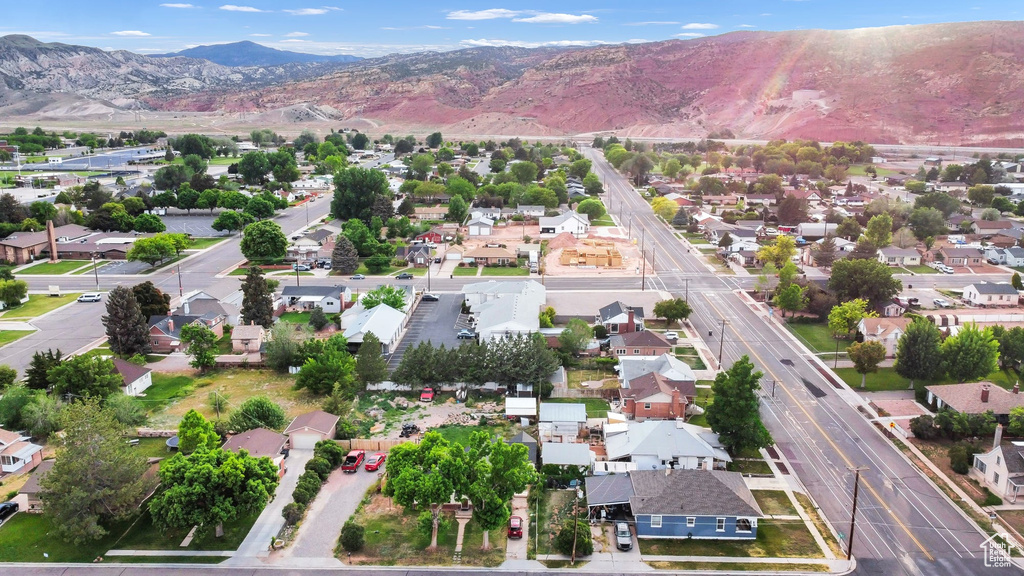 Aerial view of residential area featuring a mountain backdrop