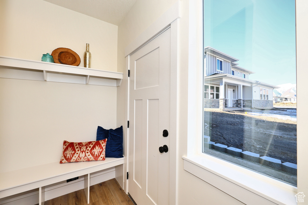 Mudroom featuring wood finished floors