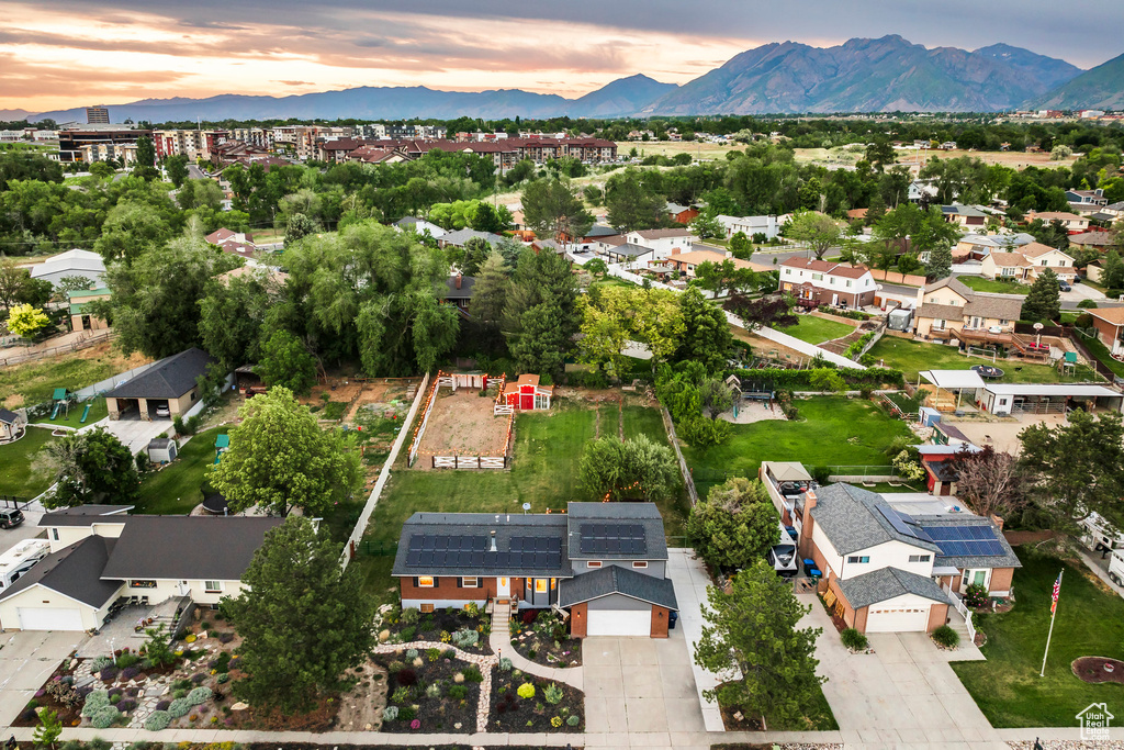 Aerial view of residential area with a mountainous background