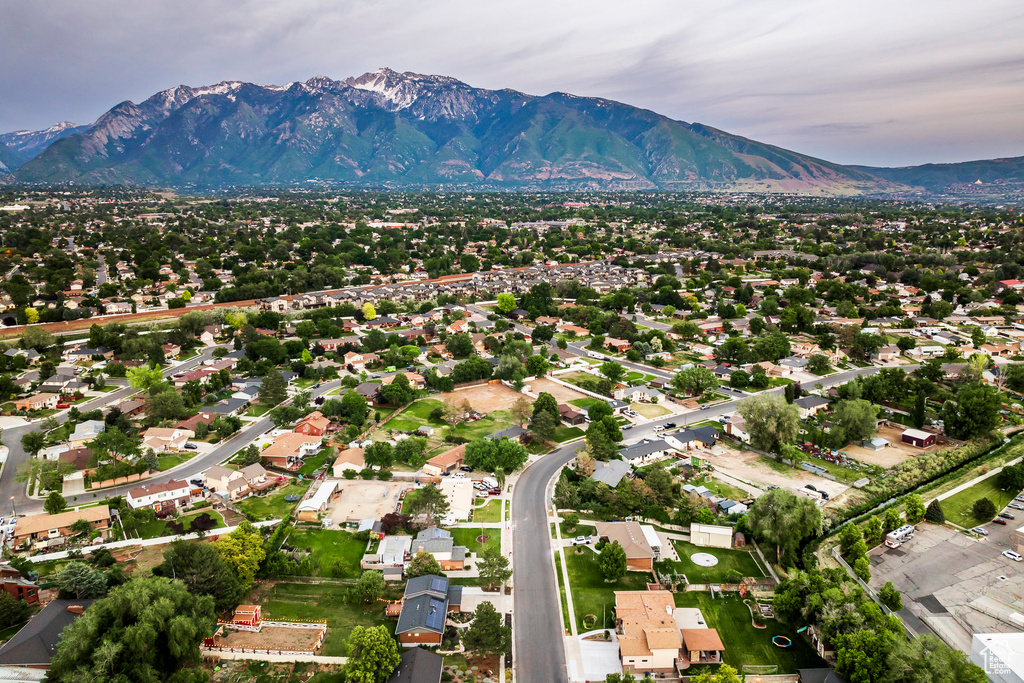 Aerial view of residential area featuring mountains