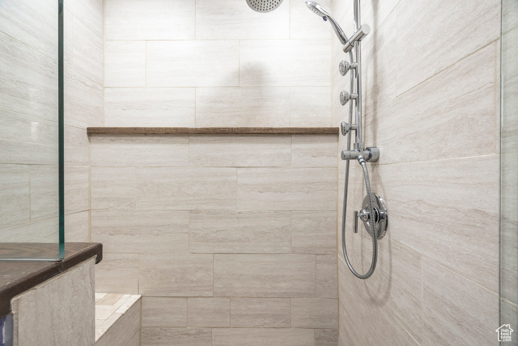 Bathroom with a tile shower