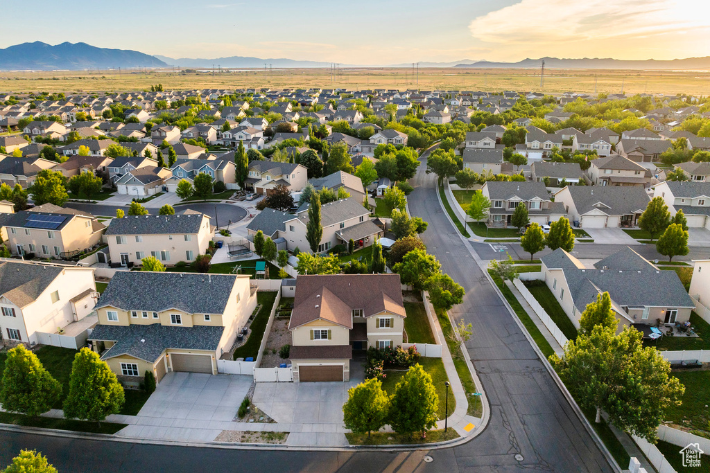 Aerial perspective of suburban area featuring mountains