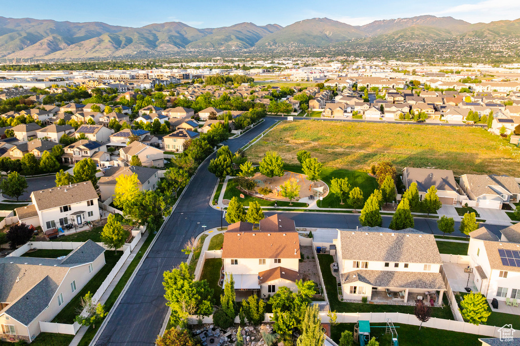 Aerial view of residential area with a mountainous background