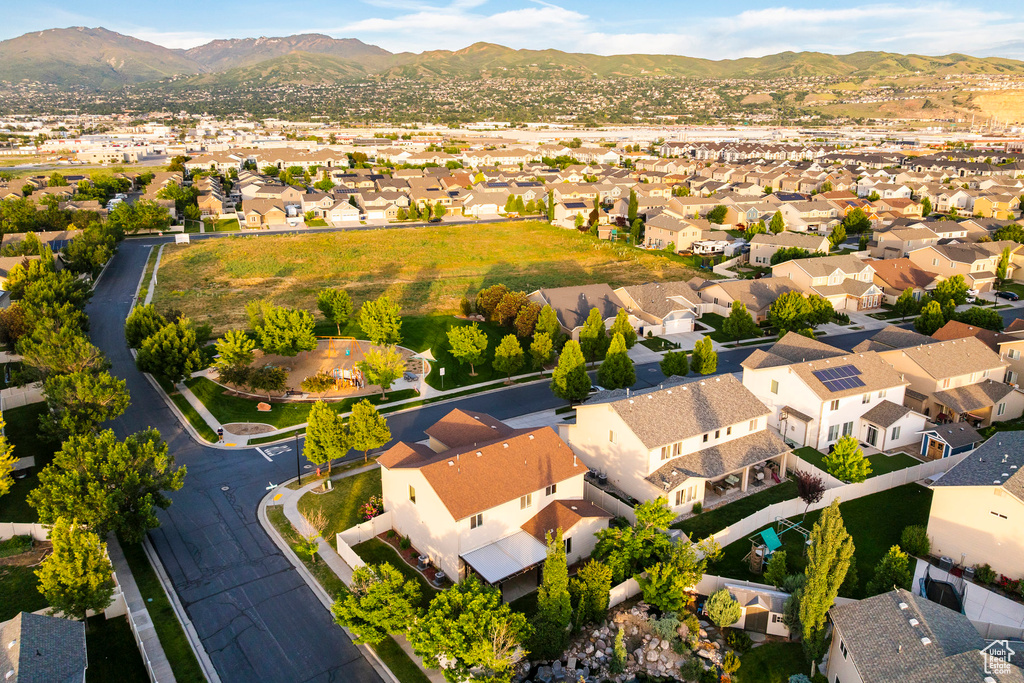 Aerial view of residential area with a mountain backdrop
