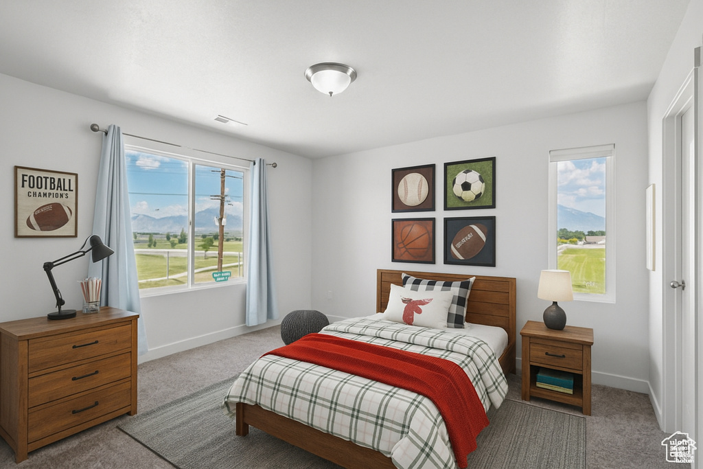 Carpeted bedroom with baseboards