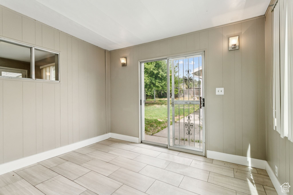 Unfurnished room with baseboards