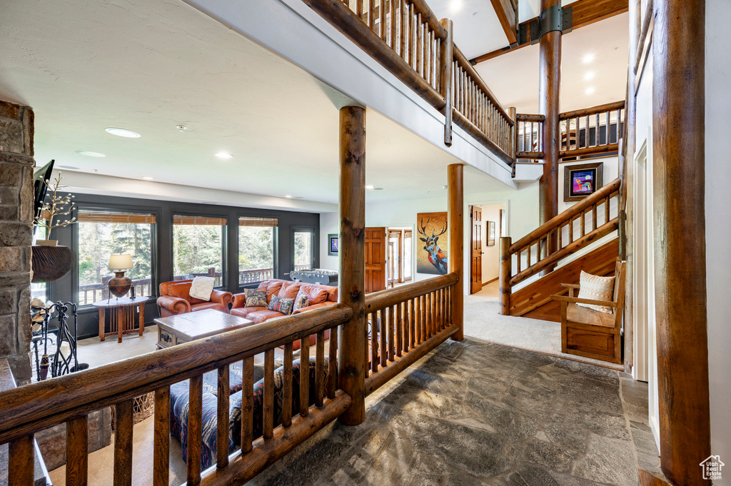 Staircase featuring recessed lighting and carpet