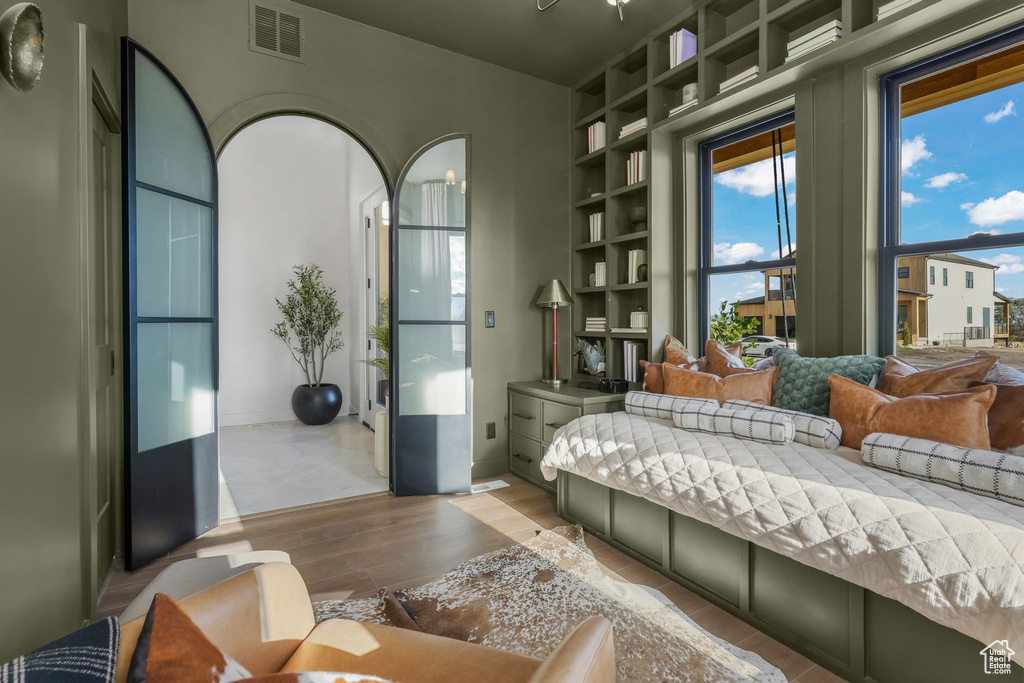 Bedroom featuring wood finished floors