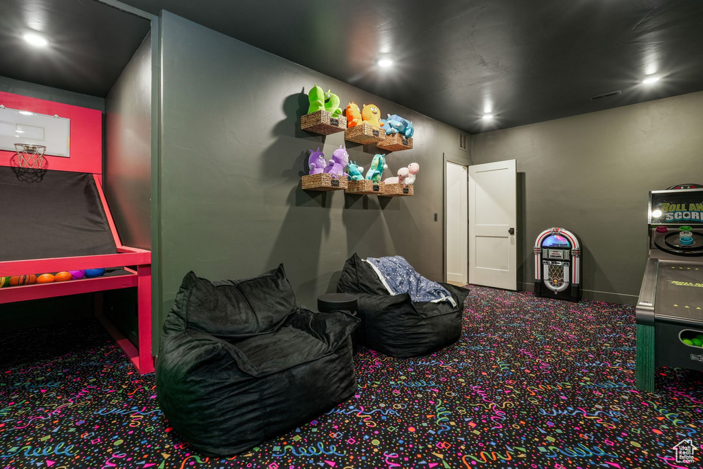 Game room featuring carpet flooring, recessed lighting, and baseboards