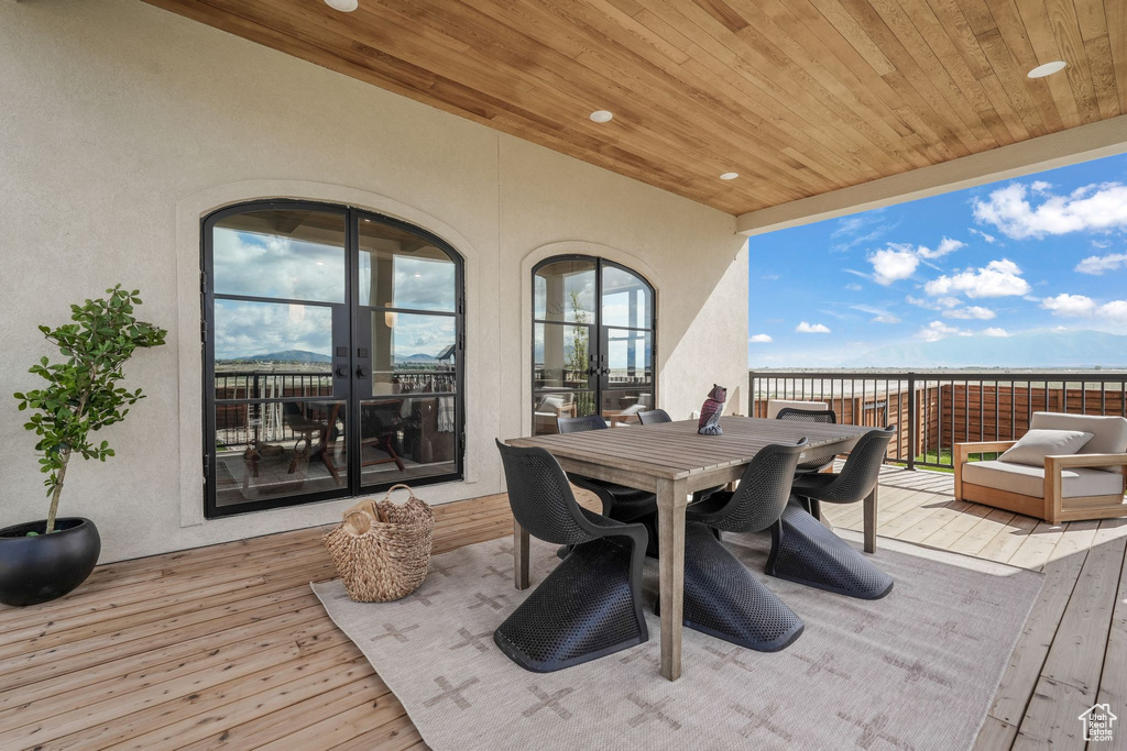 Wooden deck with outdoor dining area