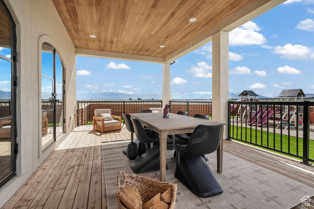 Wooden deck with outdoor dining area