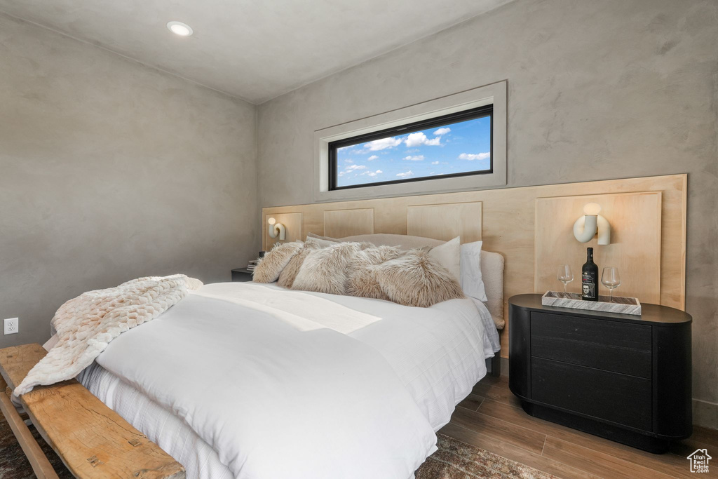 Bedroom featuring wood finished floors