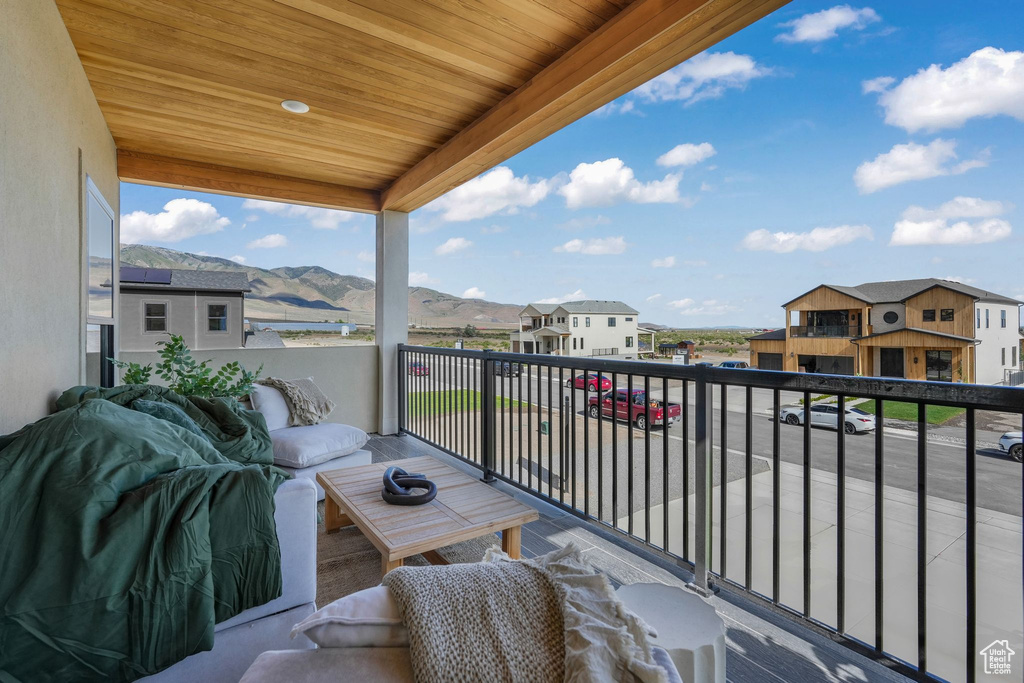Balcony with a mountain view and a residential view
