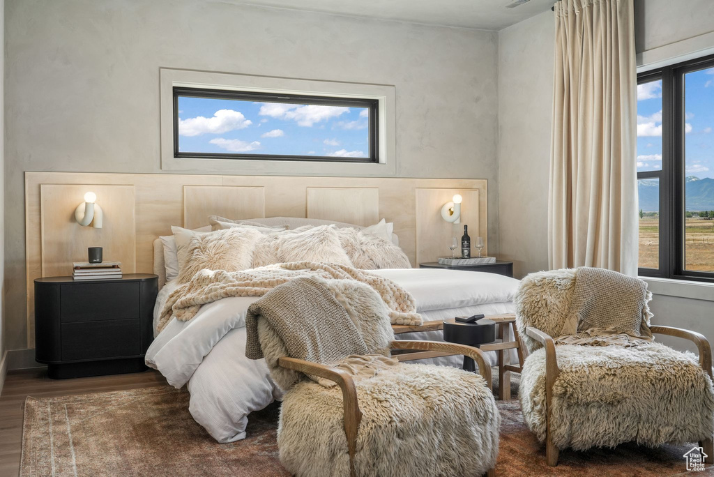 Bedroom featuring wood finished floors