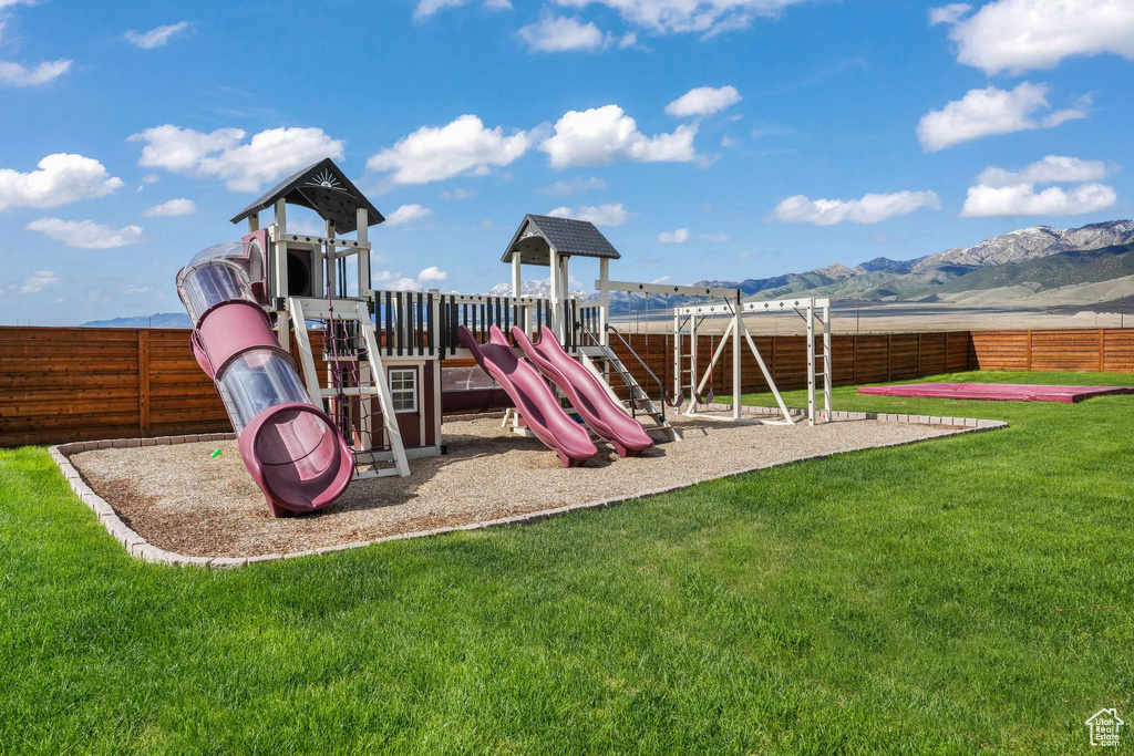 Community playground with a mountain view