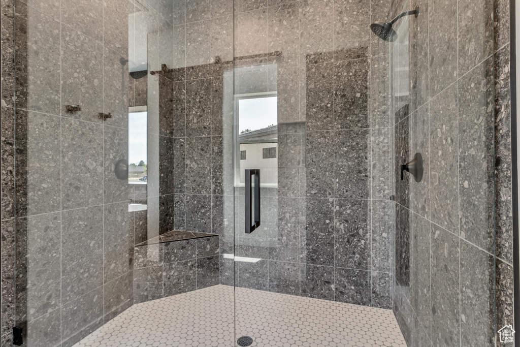 Bathroom featuring a shower stall