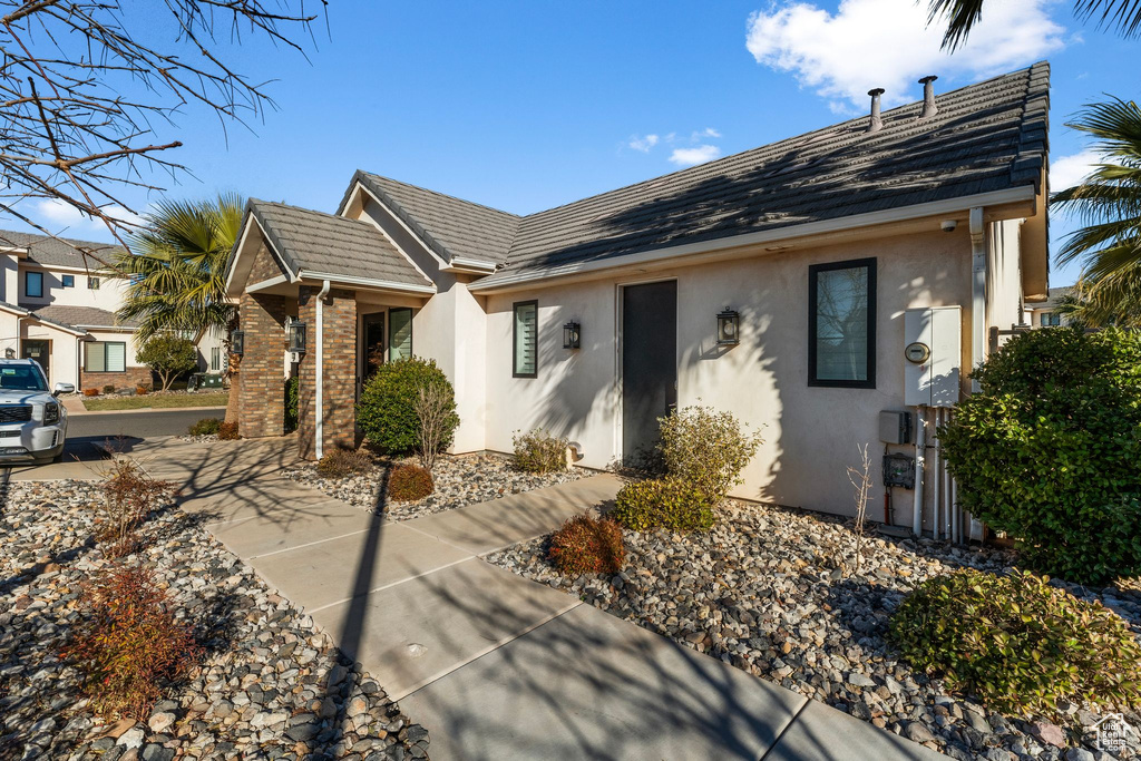 View of front of house with stucco siding