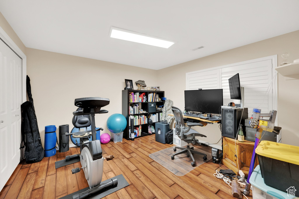 Office space featuring hardwood / wood-style floors