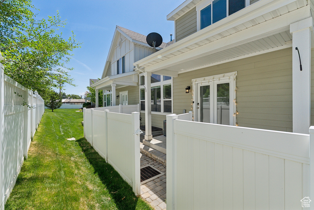 View of home\\\'s exterior featuring a wooden deck