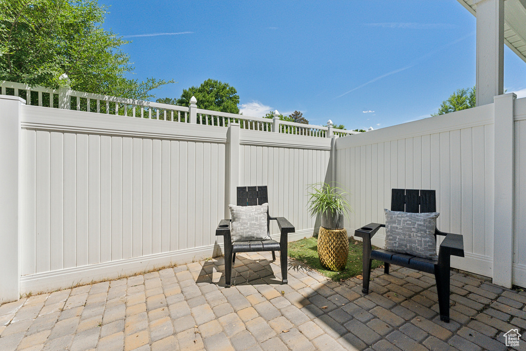Fenced backyard featuring a patio area