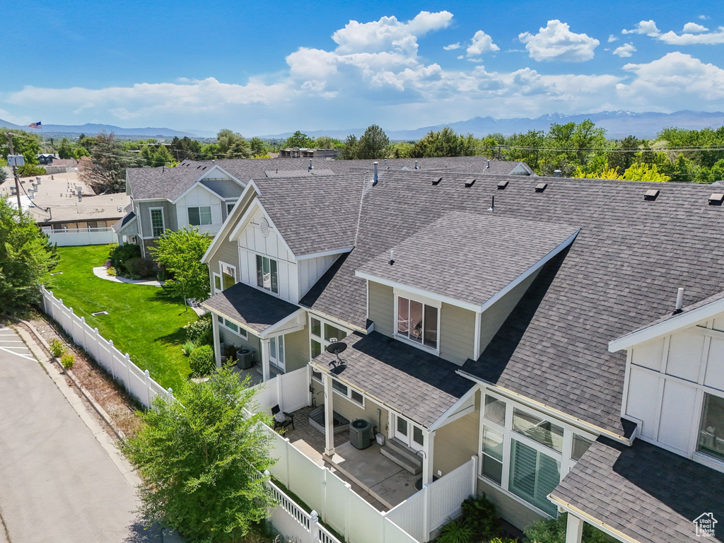 Aerial view of residential area with mountains