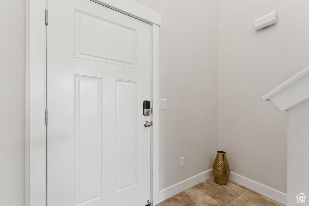 Laundry room featuring baseboards
