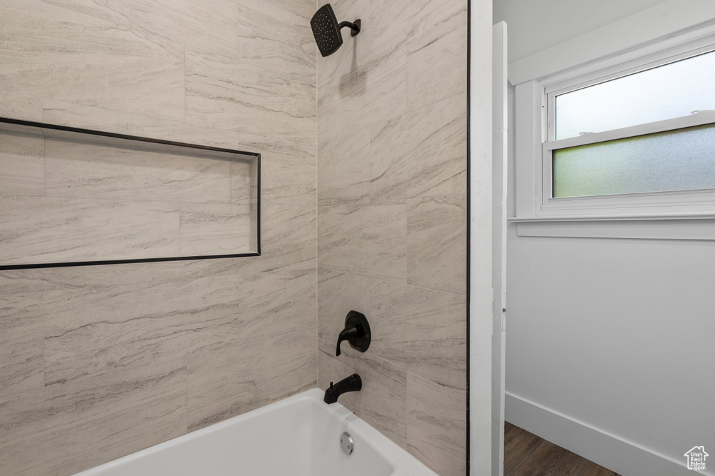 Bathroom featuring tub / shower combination