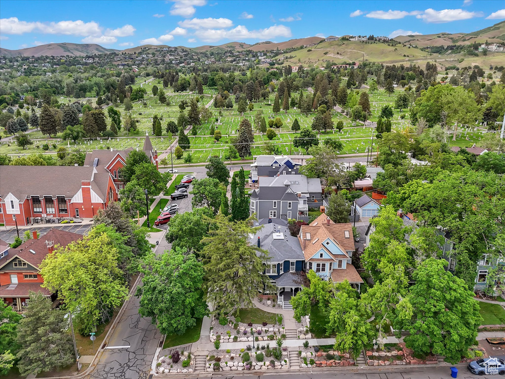 Aerial view of residential area with a mountainous background