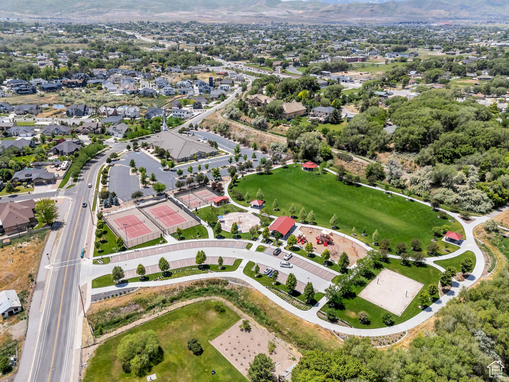 Aerial view of property's location with a mountain backdrop