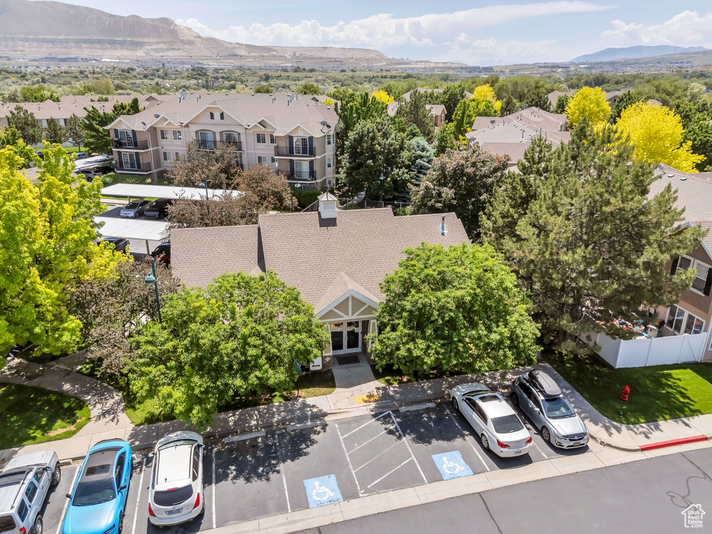 Aerial perspective of suburban area with a mountainous background